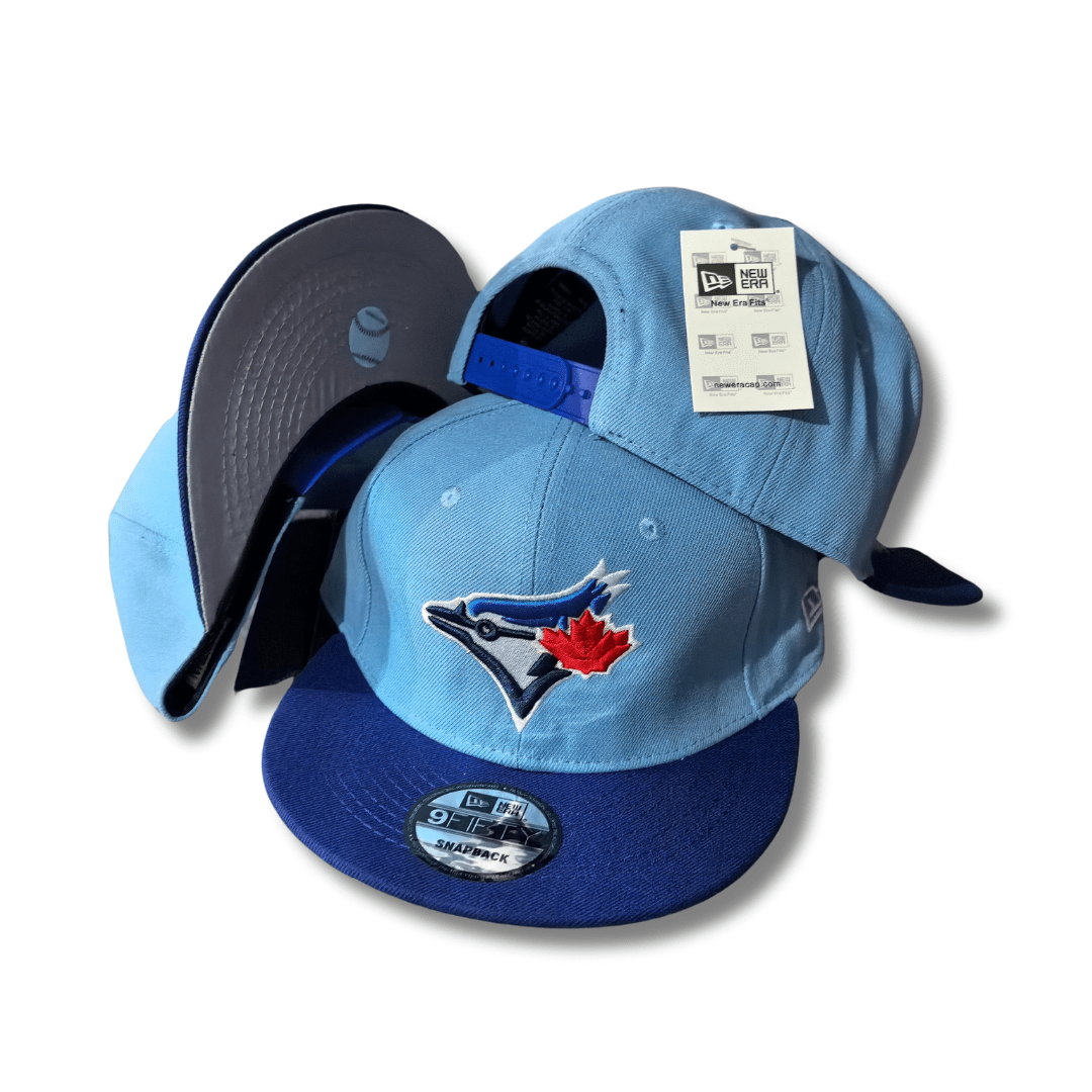 Toronto Blue Jays New Era 9FIFTY Light Blue and Royal Blue with Red Maple Leaf Logo ¨C Snapback Cap